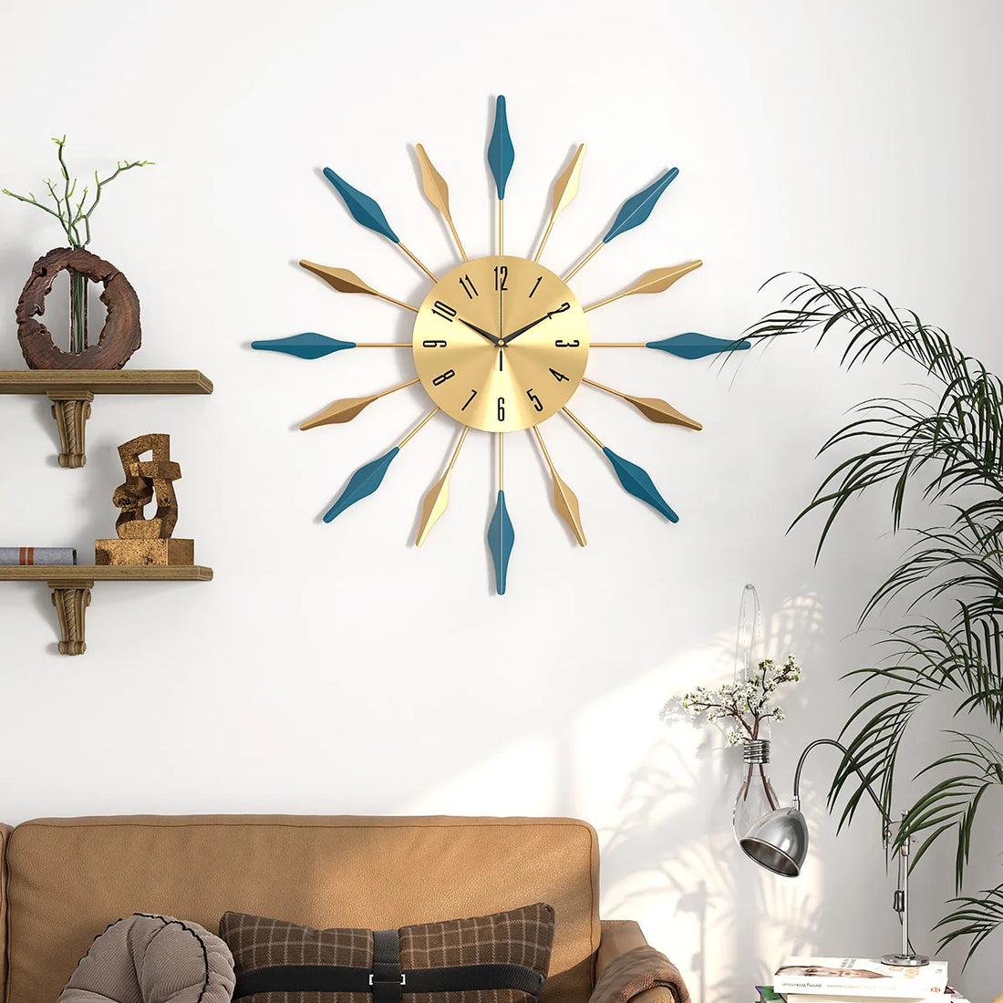 Metall-Wanduhr im Sonnenstrahl-Design mit blauen und goldenen Blättern für Esszimmer und Wohnzimmer – Ø 60 cm, rund, lautlos, mehrfarbig