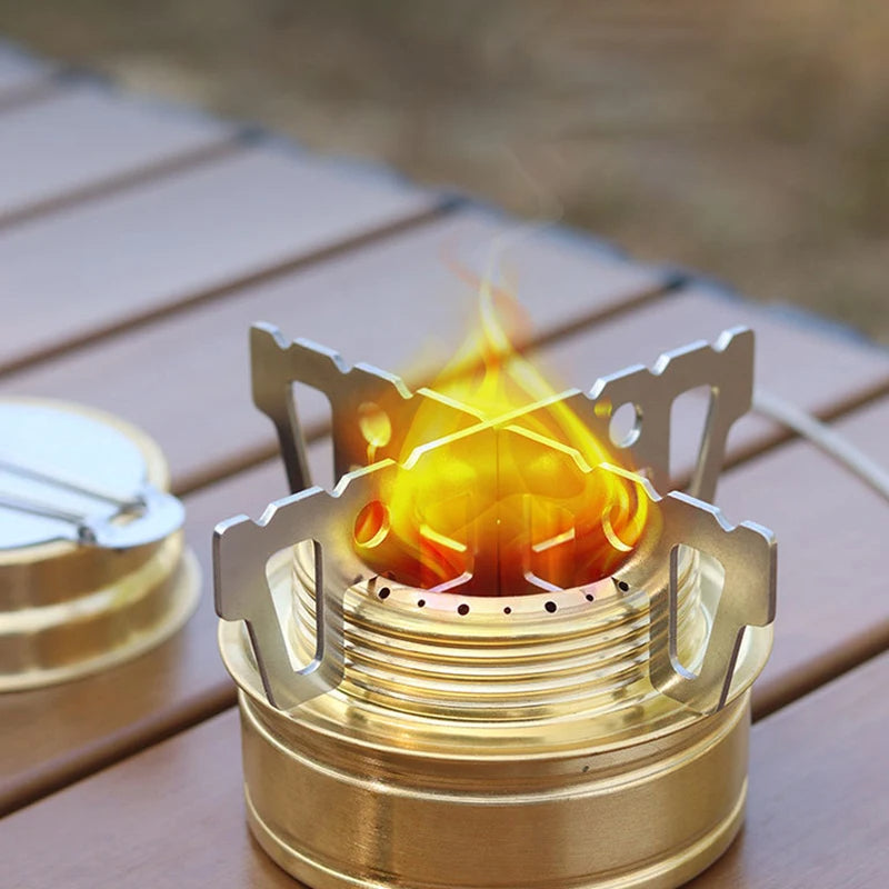 Mini-Spirituskocher aus Edelstahl für Camping und Wandern – faltbarer Griff zur Flammenregulierung, Gummidichtung, Kreuzständer, Gold, ca. 27 g