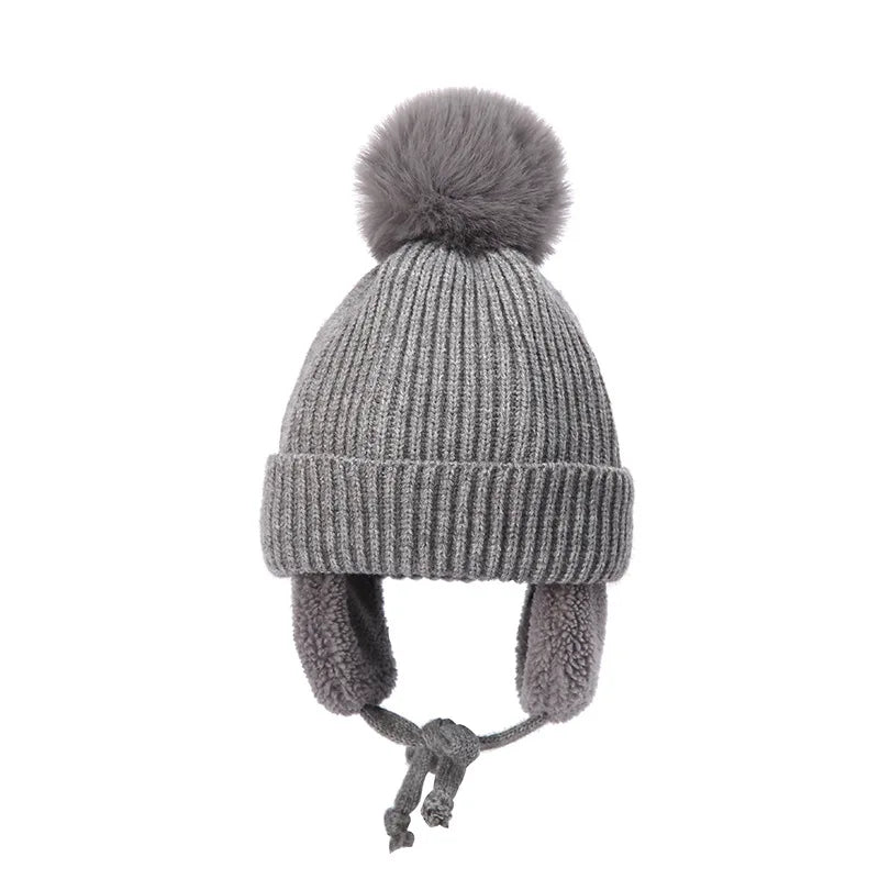 Kinder-Strickmütze mit Ohrenklappen für Winter, Spielplatz und Schulweg – Wintermütze für Kinder, 7 Farben von Beige bis Braun