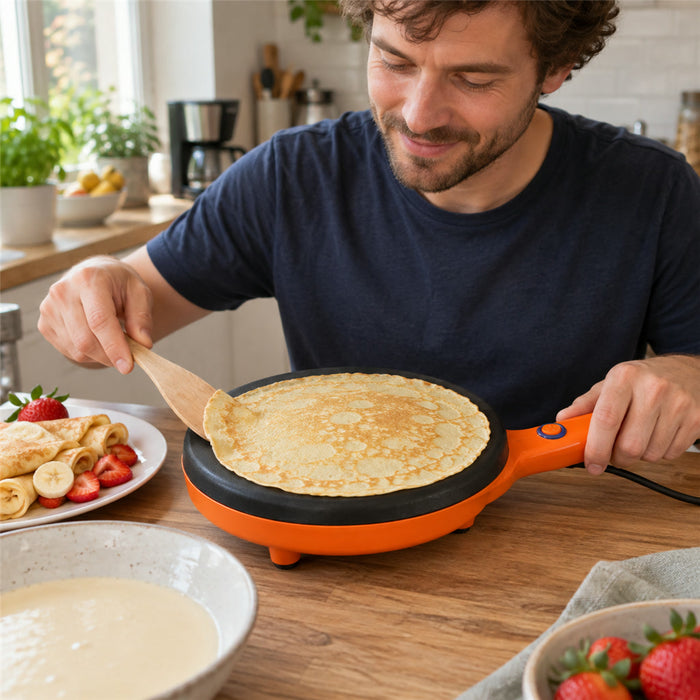 Elektrischer Crêpes-Maker mit Stiel zum Eintauchen in den Teig für dünne Crêpes, Pfannkuchen und Wraps – runde Antihaft-Platte, Orange